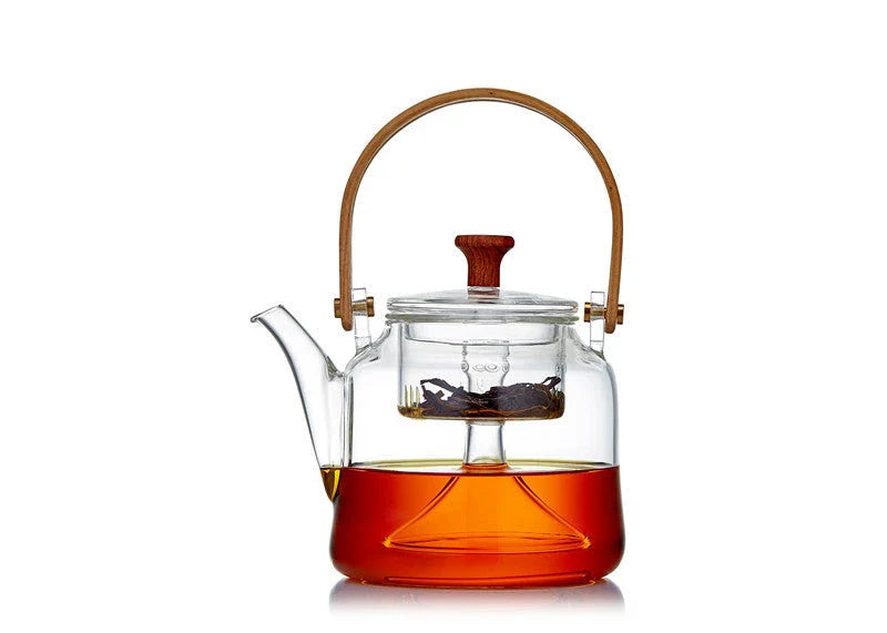 Japanese style glass bamboo handle teapot kettle on a wooden table