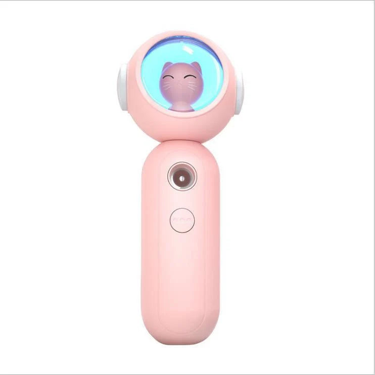 Handheld nano spray steamer in cat pink, cat white, and alien red for skin hydration