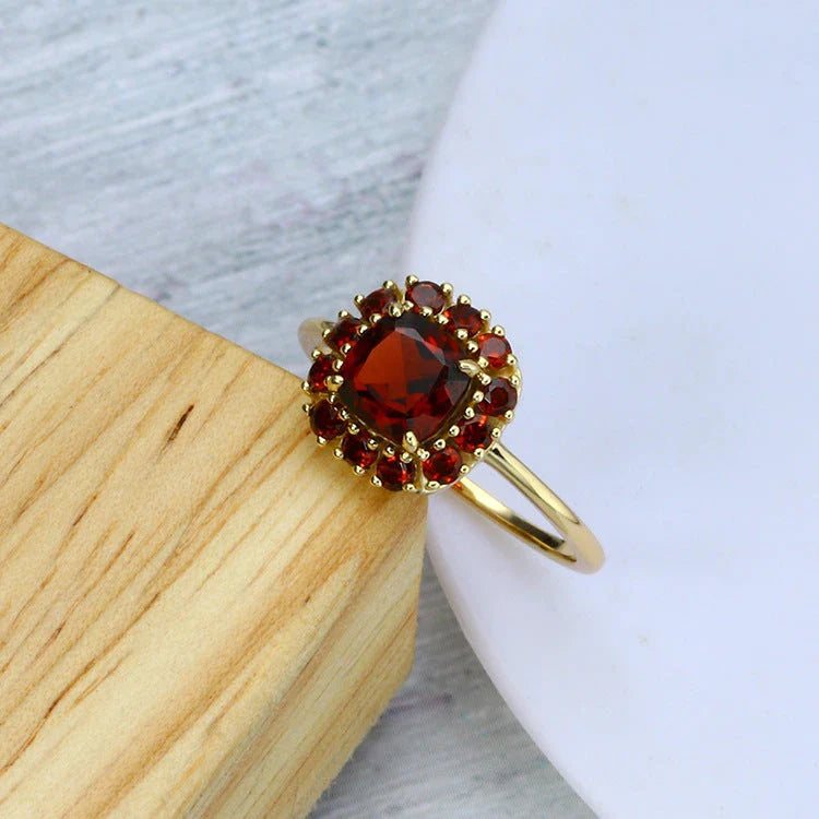 Vintage sterling silver ring with red pomegranate gem inlay, geometric design