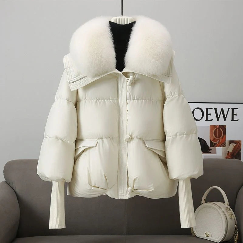 Women's winter down jacket with elegant fur collar available in brown, black, and white.