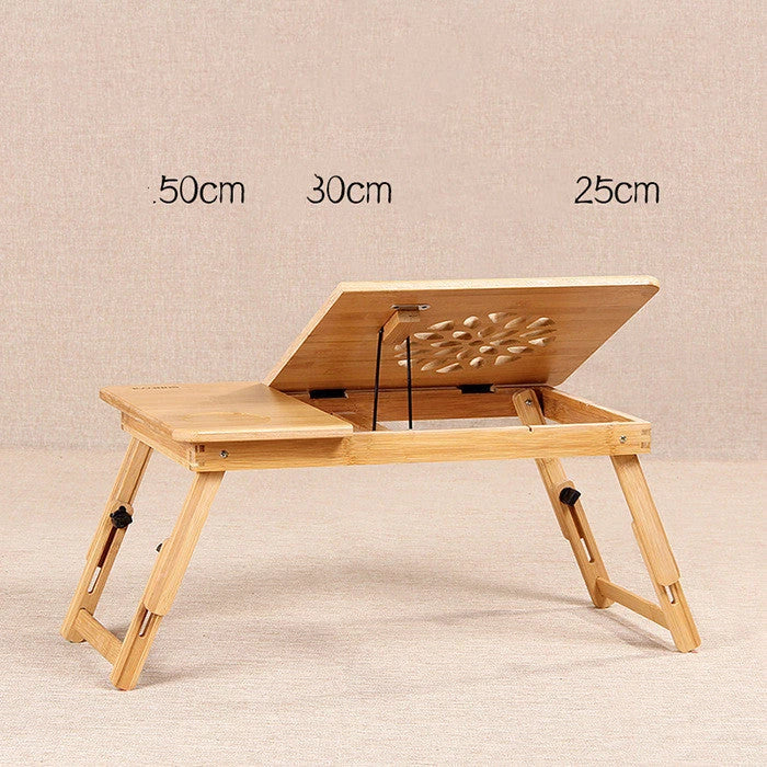 Foldable laptop bed desk with storage drawers and small fan, made from natural bamboo