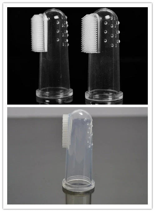 Silicone pet toothbrush set in white color, with finger-fit design for easy use and soft bristles for gentle cleaning of cats' and dogs' teeth.