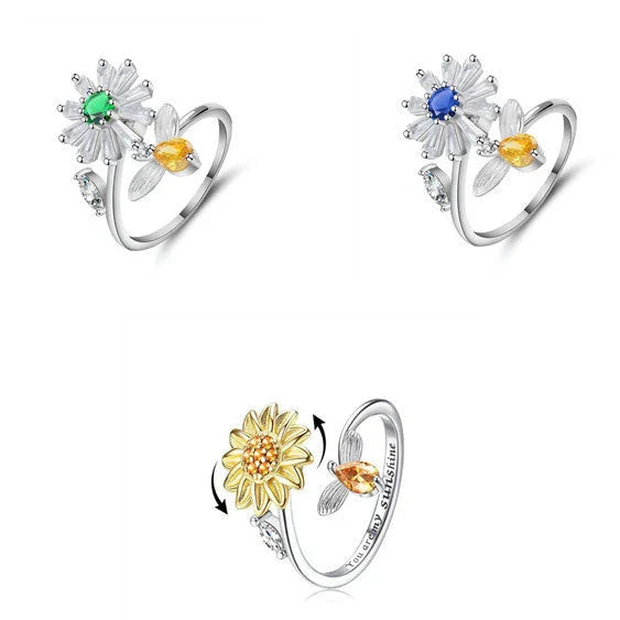 Adjustable rotating spinner ring with elegant flower and bee design in various color options