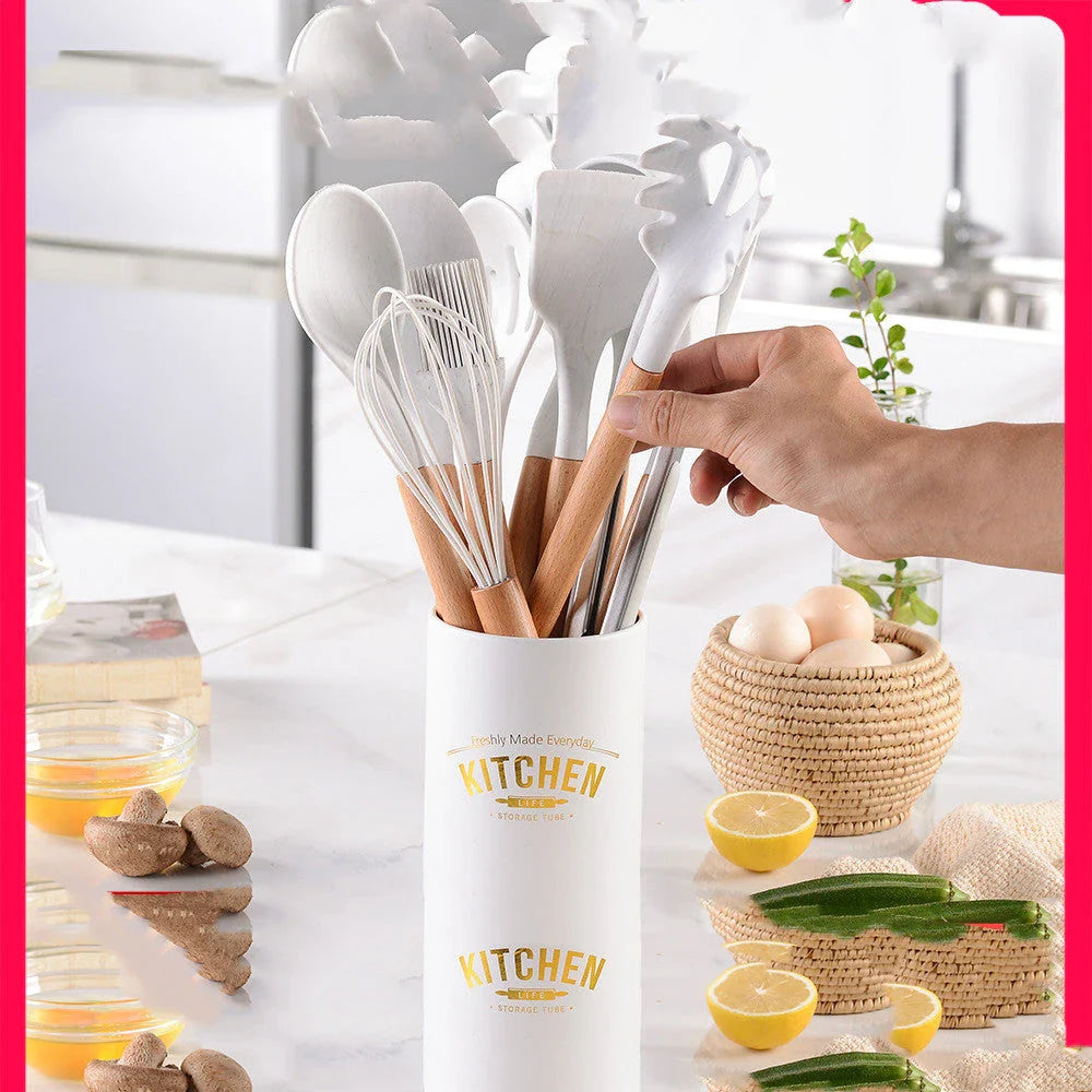 Elegant marbled silicone kitchenware set with wooden handle, perfect for cooking and baking.