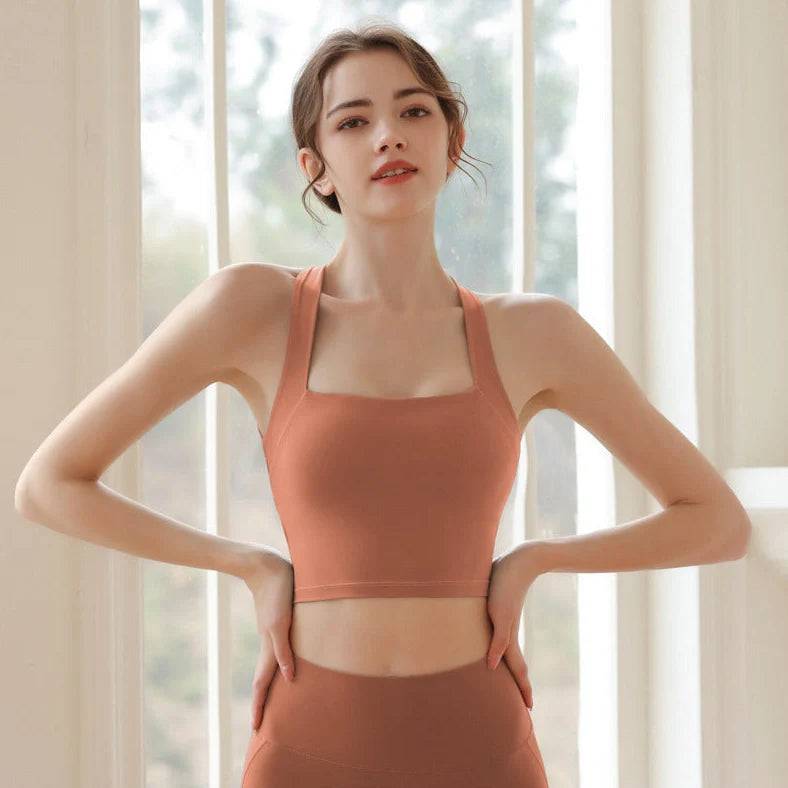 Cross gathered back exercise bra in nylon fabric with chest pad, shown in Army Green colour for running and yoga