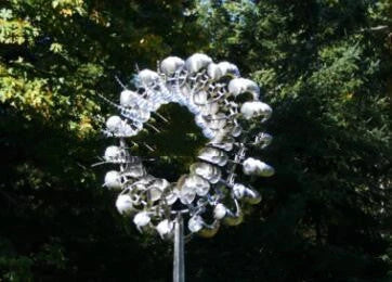 Stainless steel outdoor spinner with mesmerising independent blade rotation, perfect for adding visual interest to Kiwi gardens and patios