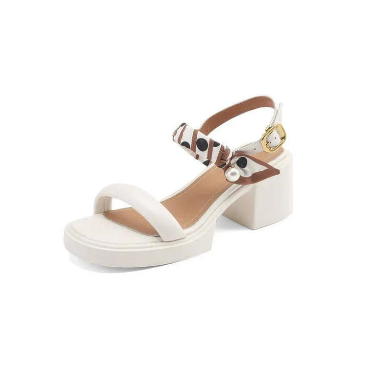 Chic open-toe leather platform sandals with adjustable buckle strap and square heel, perfect for Kiwi summer style.
