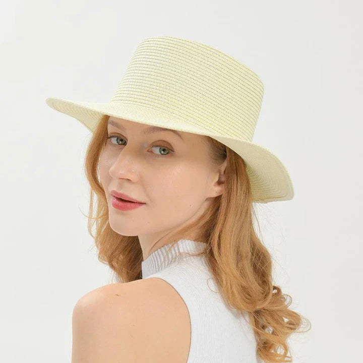 Elegant ladies' summer beach sun hat with wide brim, designed for sun protection and style in New Zealand