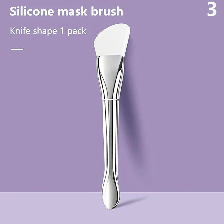 A soft, flexible silicone makeup and mask brush with a durable plastic handle, perfect for precise, mess-free application of facial products.