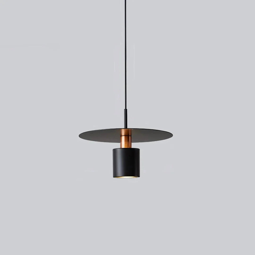 A modern, minimalist pendant light with a sleek, painted metal design, perfect for enhancing the ambiance of cafes, bedrooms, and other contemporary interior spaces.