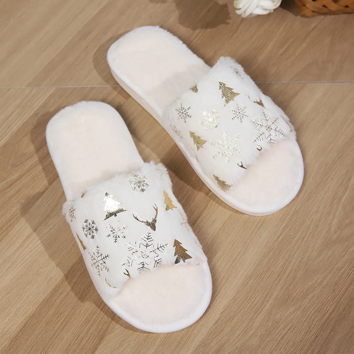 Christmas plush slippers with open-toe design and festive motifs