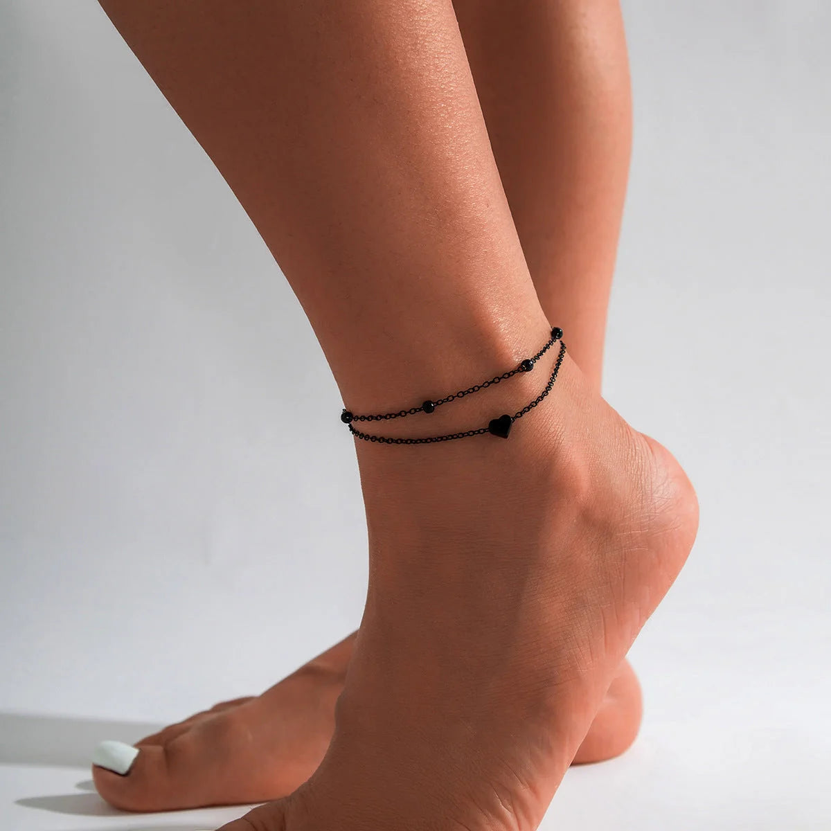 Beach Star Tassel Ankle Rings in gold and black, perfect for summer outfits