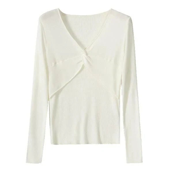 A stylish V-Neck jumper in dark grey, featuring a unique criss-cross design and a flattering slim fit for the modern Kiwi woman.