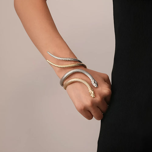 Gold twisted snake bracelet and ring jewellery set with exaggerated winding design