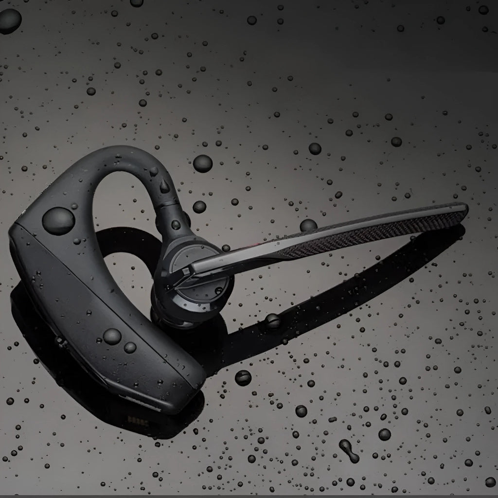 Black Bluetooth sports headphones with USB charging port and battery display on a white background.