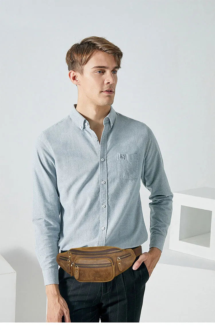 Brown leather shoulder messenger bag with single strap showing dimensions of 32x15x9cm