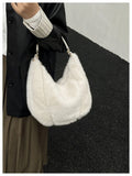 Beige one shoulder underarm bag in plush with splicing details, horizontal square shape, and single strap