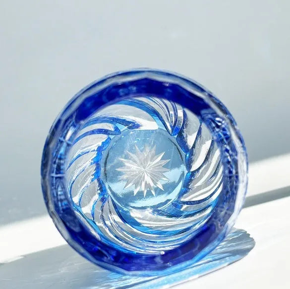 Blue Jianghu cut crystal glass tumbler 80x190mm on a table