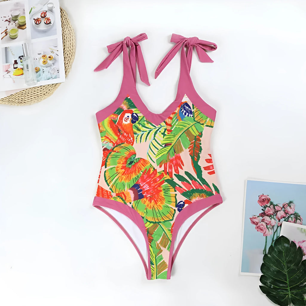 Women's pink retro one-piece swimsuit with V-neck, backless design and thin skirt cover