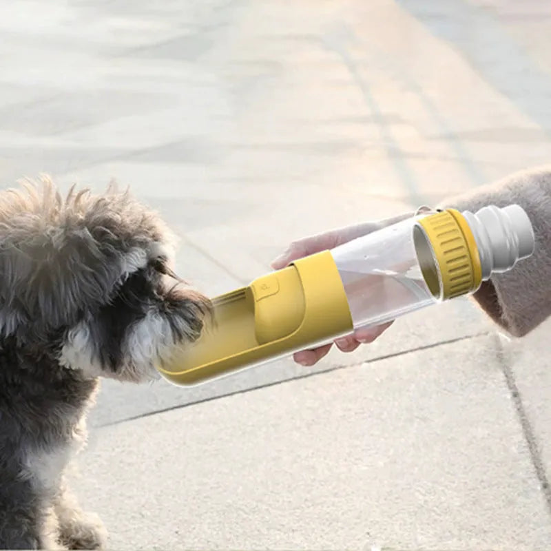 Dark blue portable dog water bottle with integrated drinking bowl and leak-proof cap.