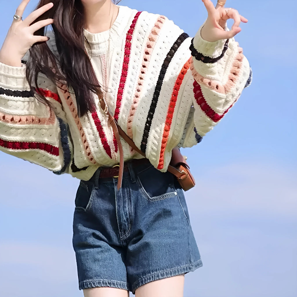 Retro rainbow striped hollow knit sweater with batwing sleeves and colourful thread detailing