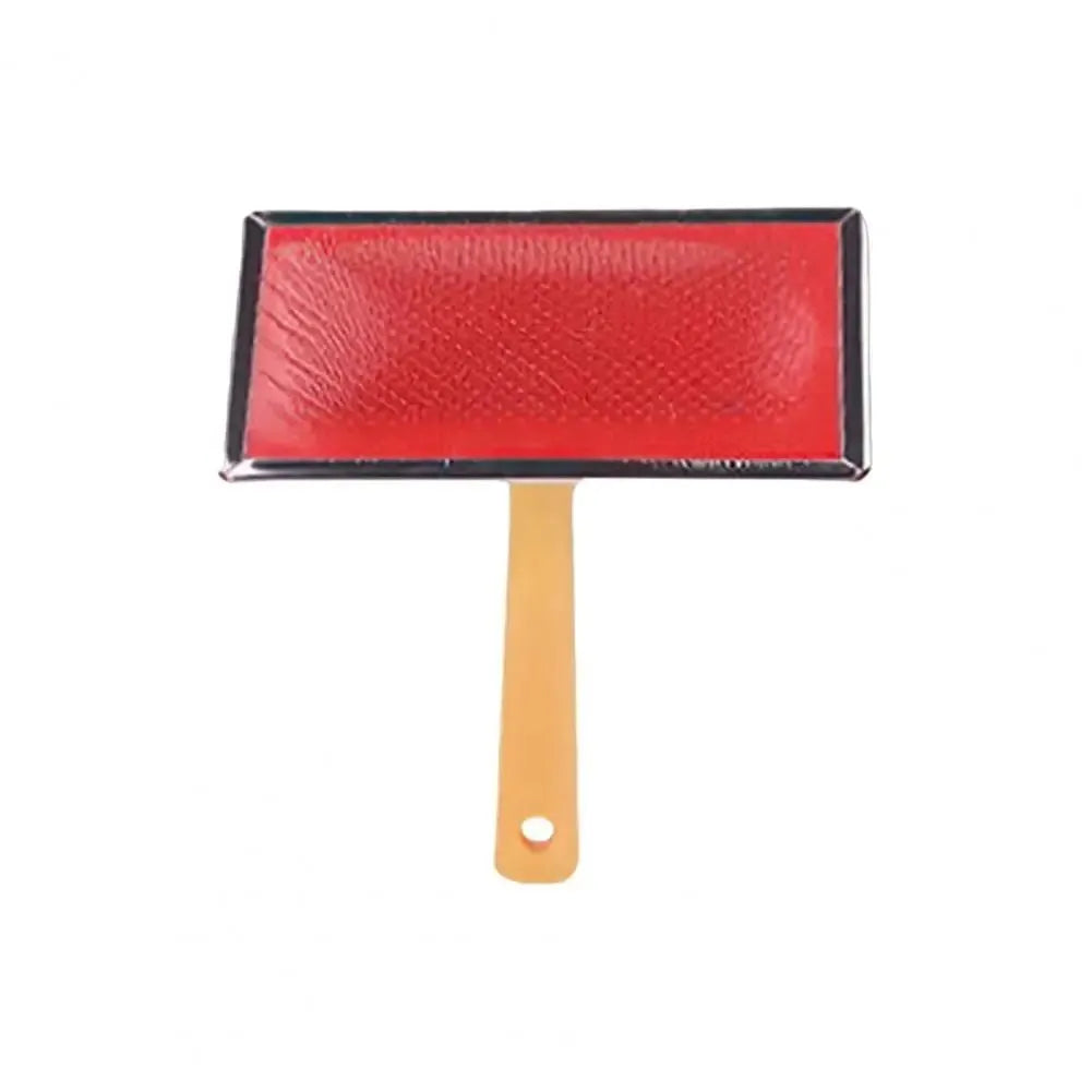 Stainless steel pet grooming comb with wooden handle on a white background for detangling dog and cat fur