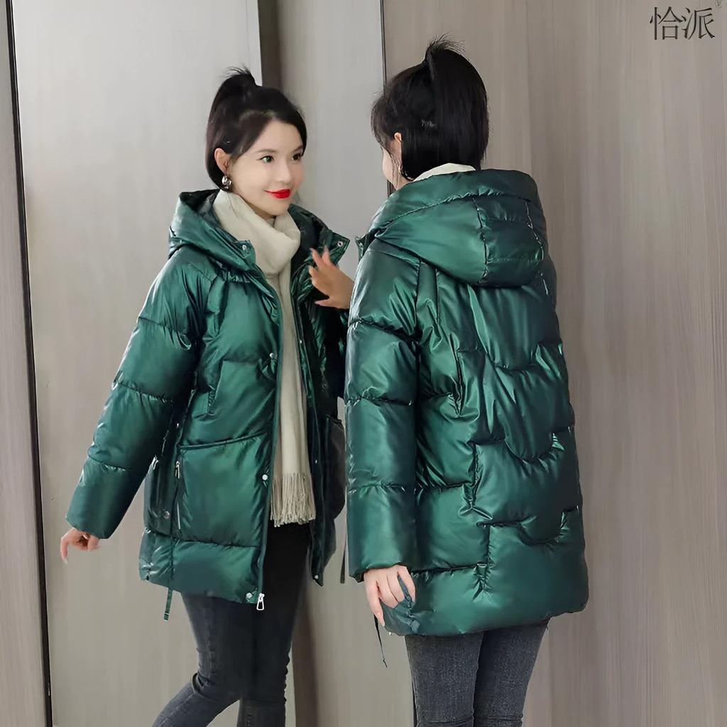 Women's loose thick hooded winter jacket in black, shown on a hanger.