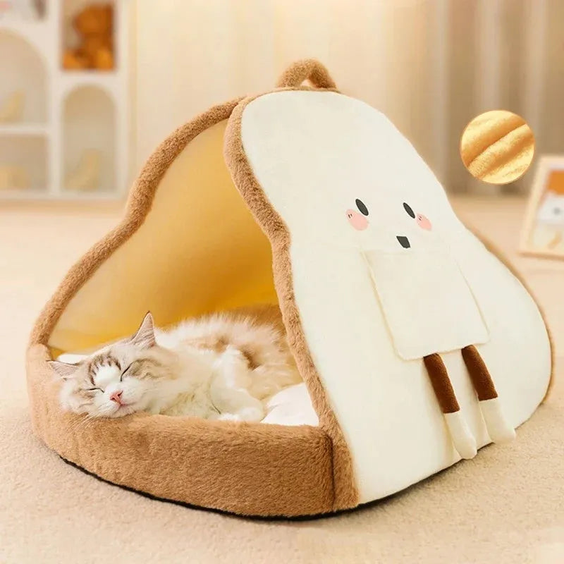 Green insulated cat tent pet bed with fleece blanket, shown in a home setting.