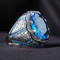 Antique silver geometric couple ring with blue zircon stone centrepiece showing European and American styling