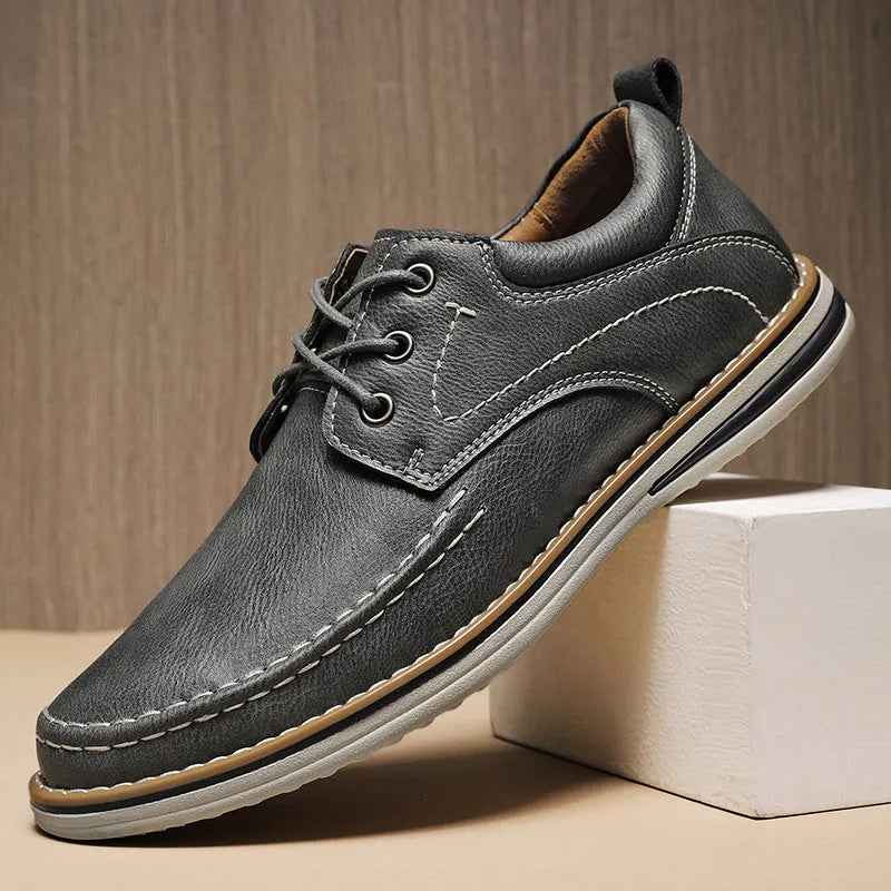 Men's black genuine leather casual shoes with round toe and front lace-up design