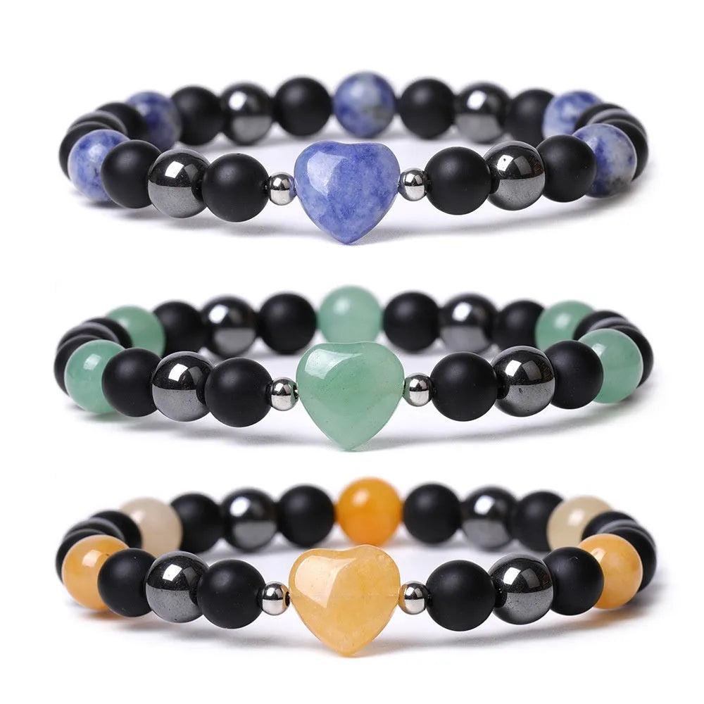 Hand-cut geometric peach heart stone bracelet with moon and planet decorative elements in eight colour options