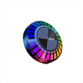 Black portable wireless Bluetooth subwoofer with 72-colour breathing rhythm lighting on a desktop
