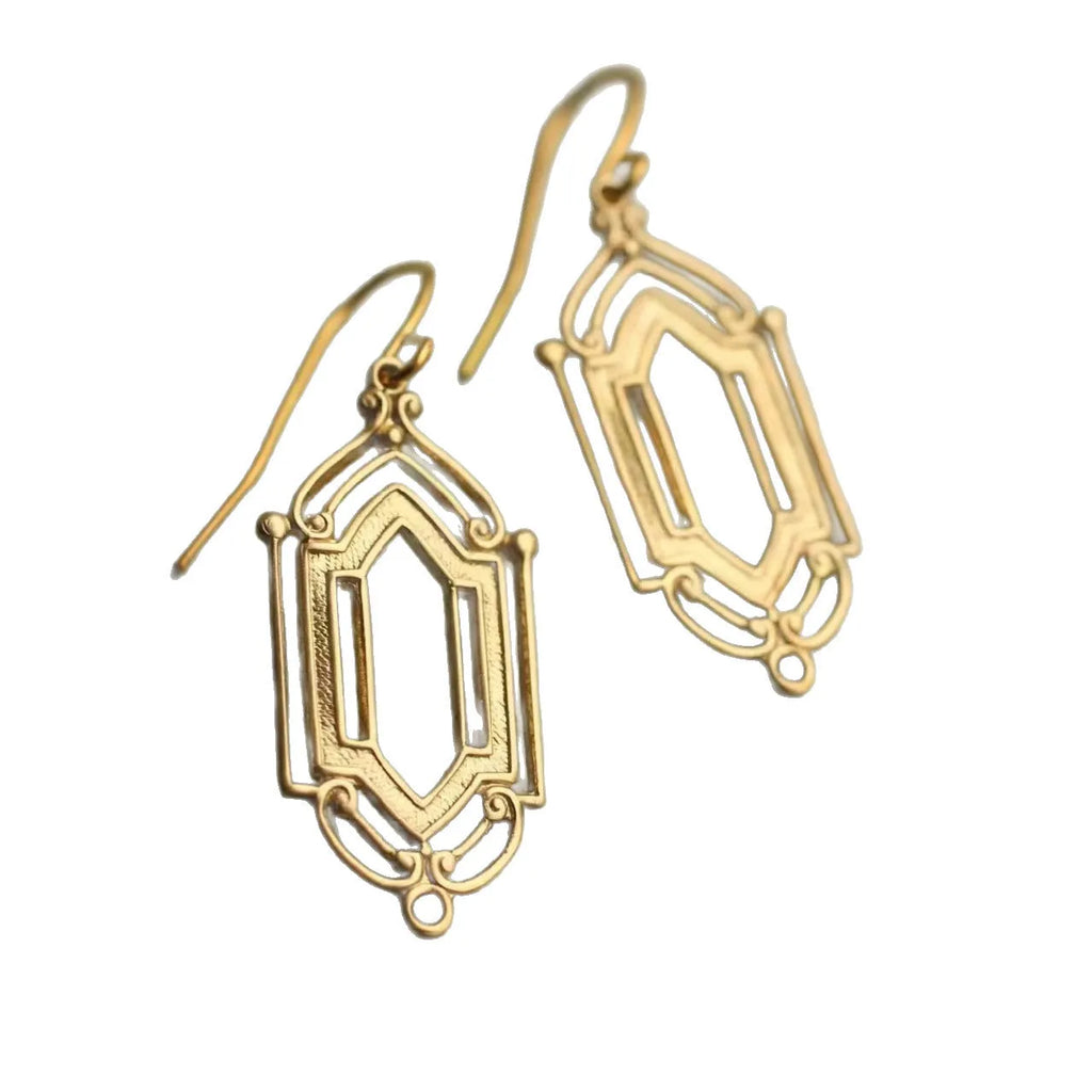 Gold flower window hollow stud earrings with geometric copper design and electroplated brass-style finish