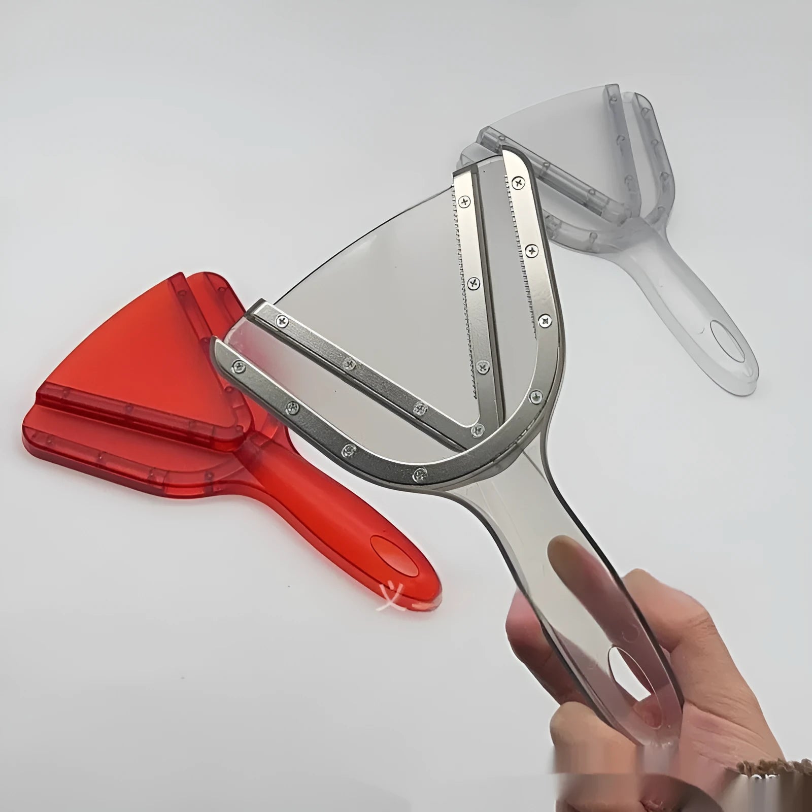 Adjustable telescopic can opener and bottle opener with non-slip red handle on a white background.