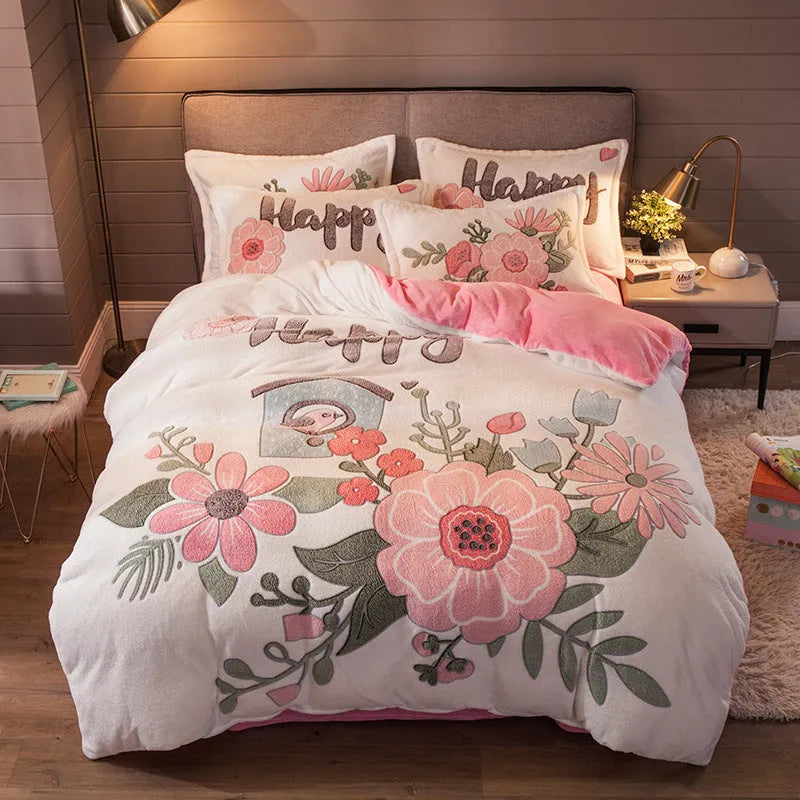 Four-piece milk velvet bedding set with quilt cover, bed sheet, and pillowcases in warm colour