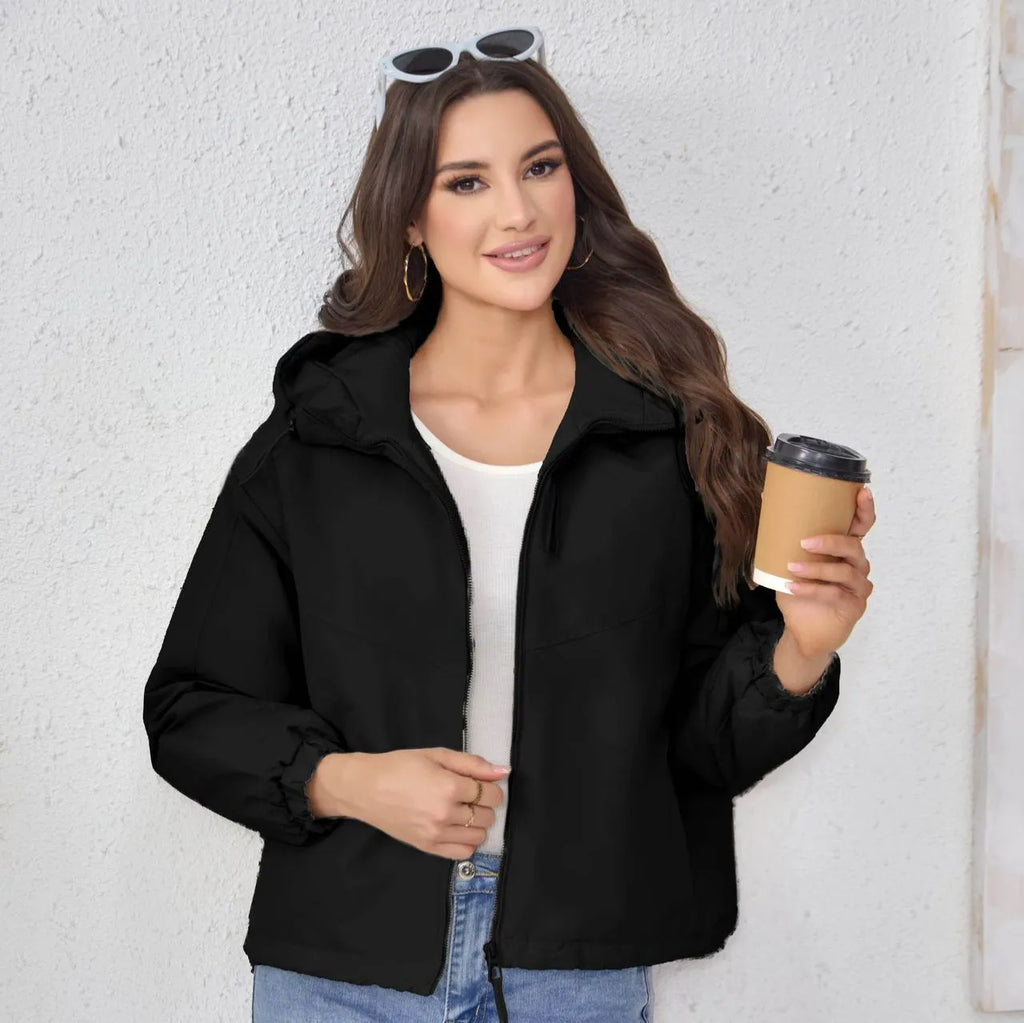 Women's loose fit hooded shell jacket in black, grey, or purple solid colour