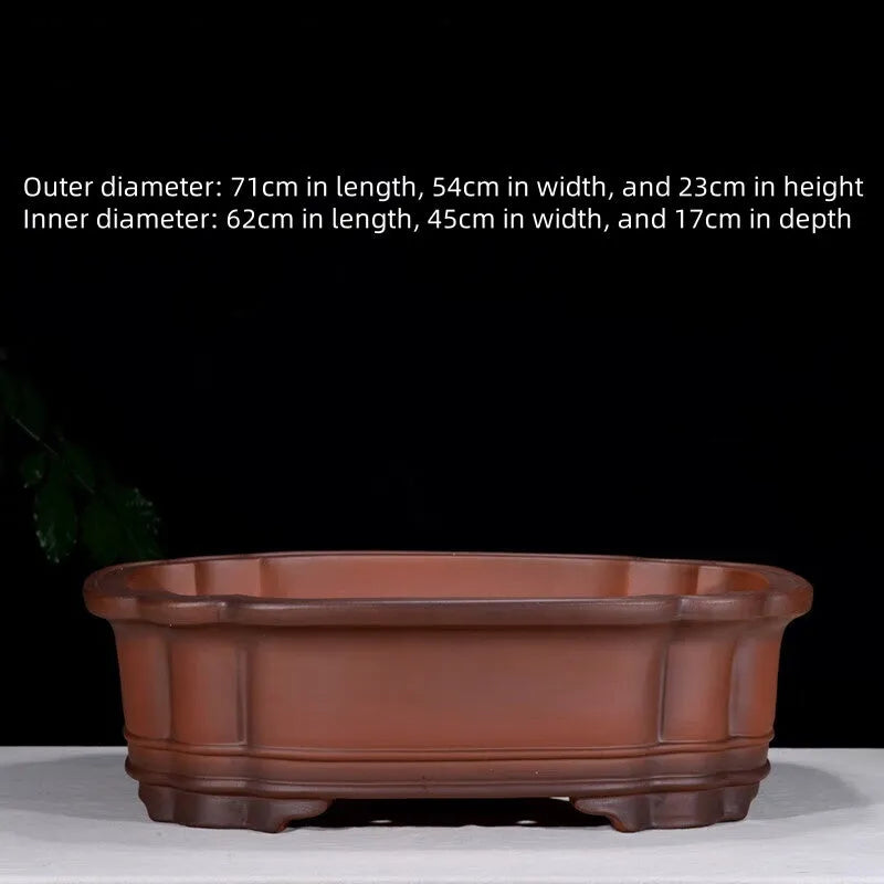 Large antique finish purple clay flowerpot with carved tree stump design featuring pine, cypress, pomegranate, golden marble and crabapple motifs