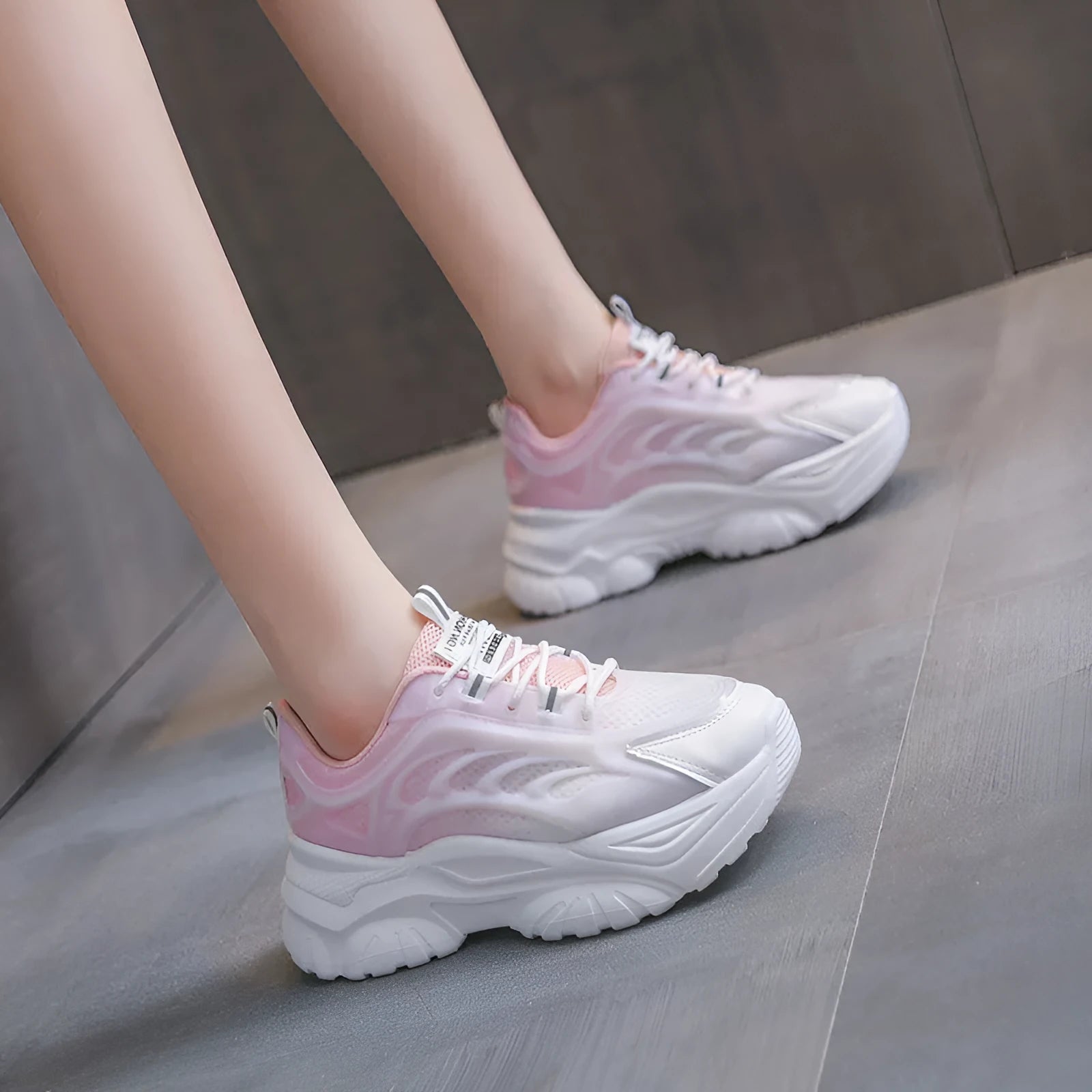 Women's blue satin lace-up casual sports shoes with round toe on a white background.