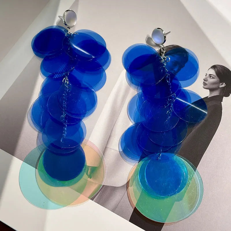 Gradient blue hand-woven long fringe earrings with artificial crystal and sterling silver needle on white background
