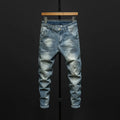 Men's slim-fit dark blue cotton denim jeans with a mid-waist and ankle-length leg.