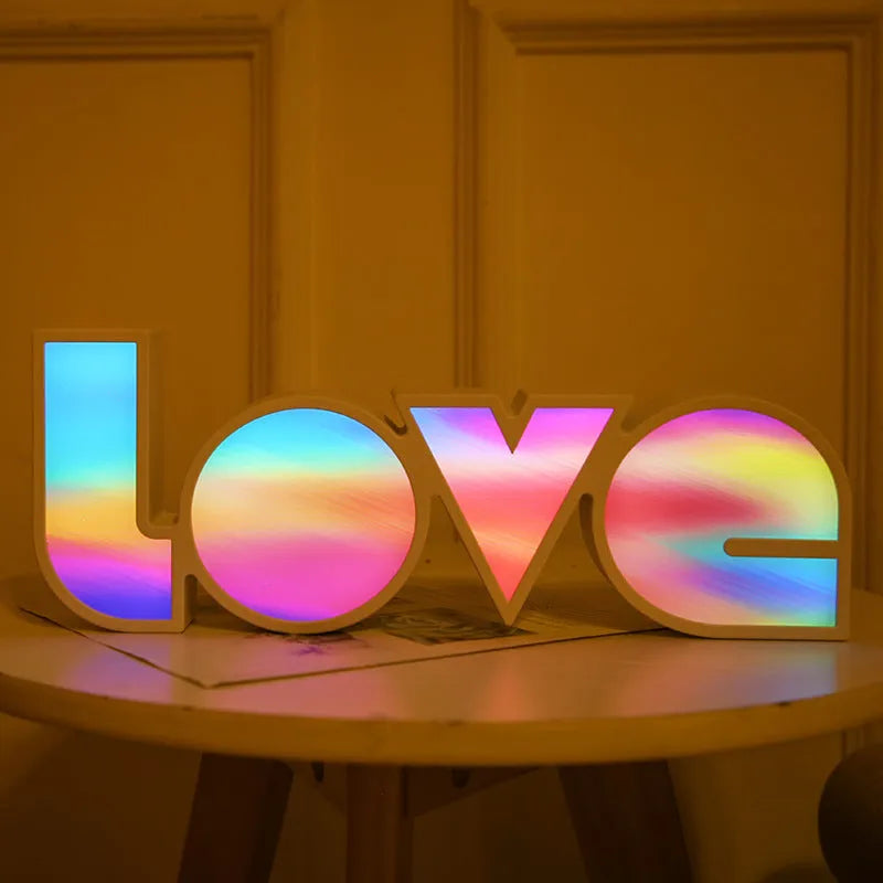Rainbow halo style LED LOVE light sign measuring 35.5 x 13.5 cm for Valentine's Day decoration