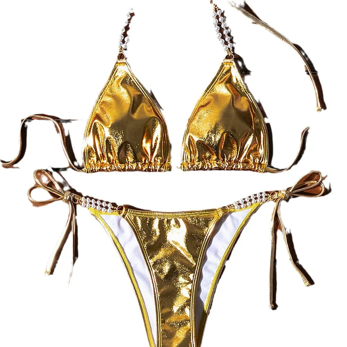 Gold women's bikini swimsuit with halter neck, lace-up back, and pearl chain decoration