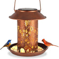 Solar-powered outdoor lamp feeder in hummingbird design with iron art construction