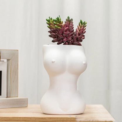 European style ceramic flower pots with decorative figures and gods in white, pink, and brown