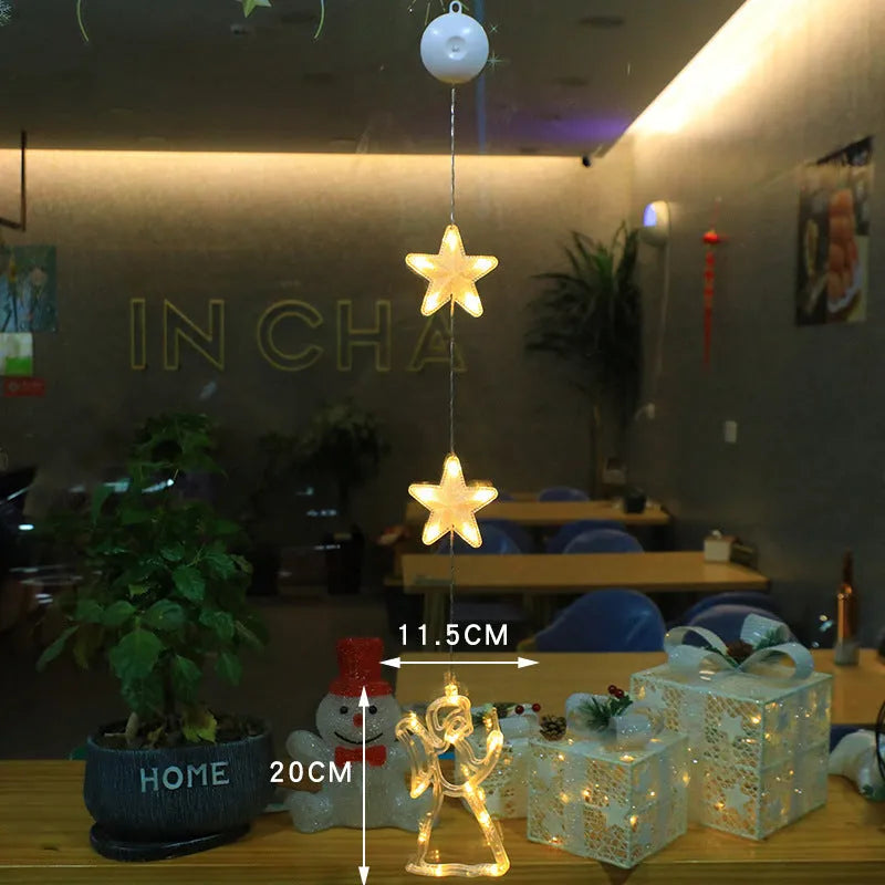 Set of three battery-powered LED Christmas pendant lights with suction cups for window decoration