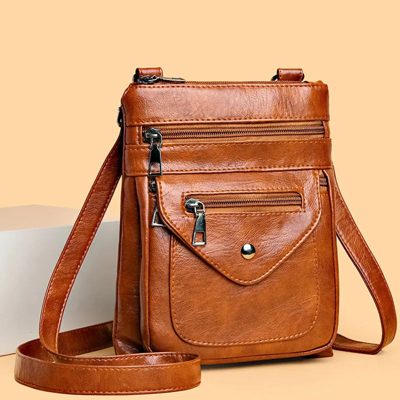 Women's vertical crossbody mobile phone bag in PU material with shoulder strap