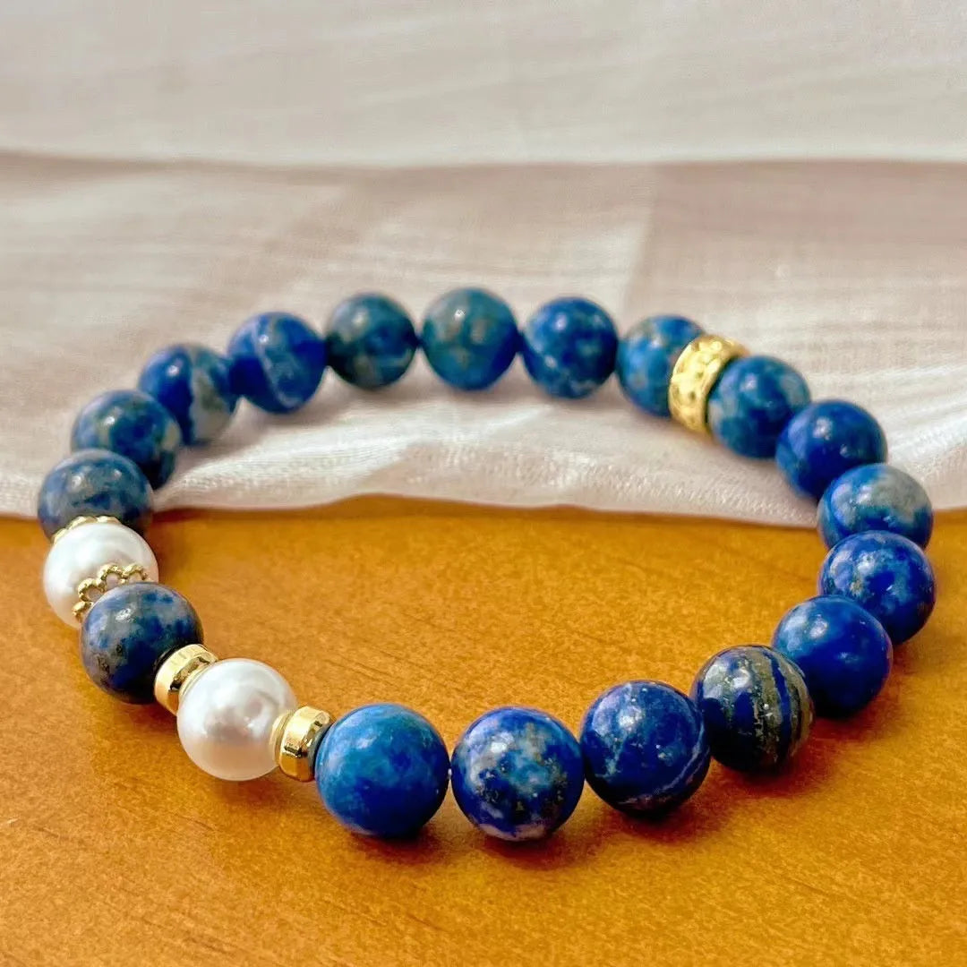 Lapis lazuli green gold stone bracelet with Chinese retro artistic design on wrist