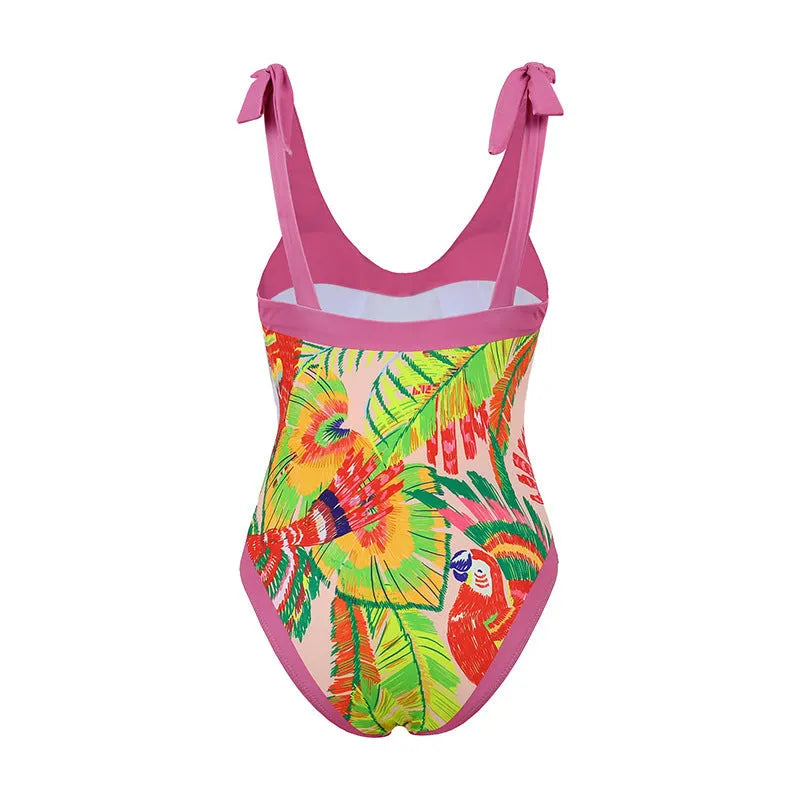 Women's pink retro one-piece swimsuit with V-neck, backless design and thin skirt cover