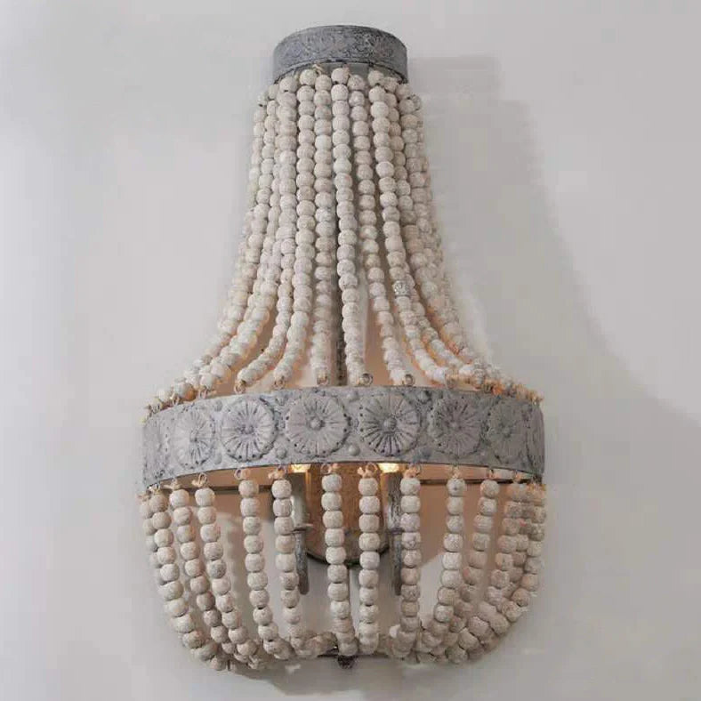 Wooden bead chandelier with distressed antique finish providing ambient lighting for 10-15 square metre rooms using E14 screw lamp holders and 220V voltage