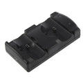 Black PS3 dual controller charging dock station showing two controllers on USB charging base.